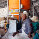 Women workers fold plant bags at Medigrow
